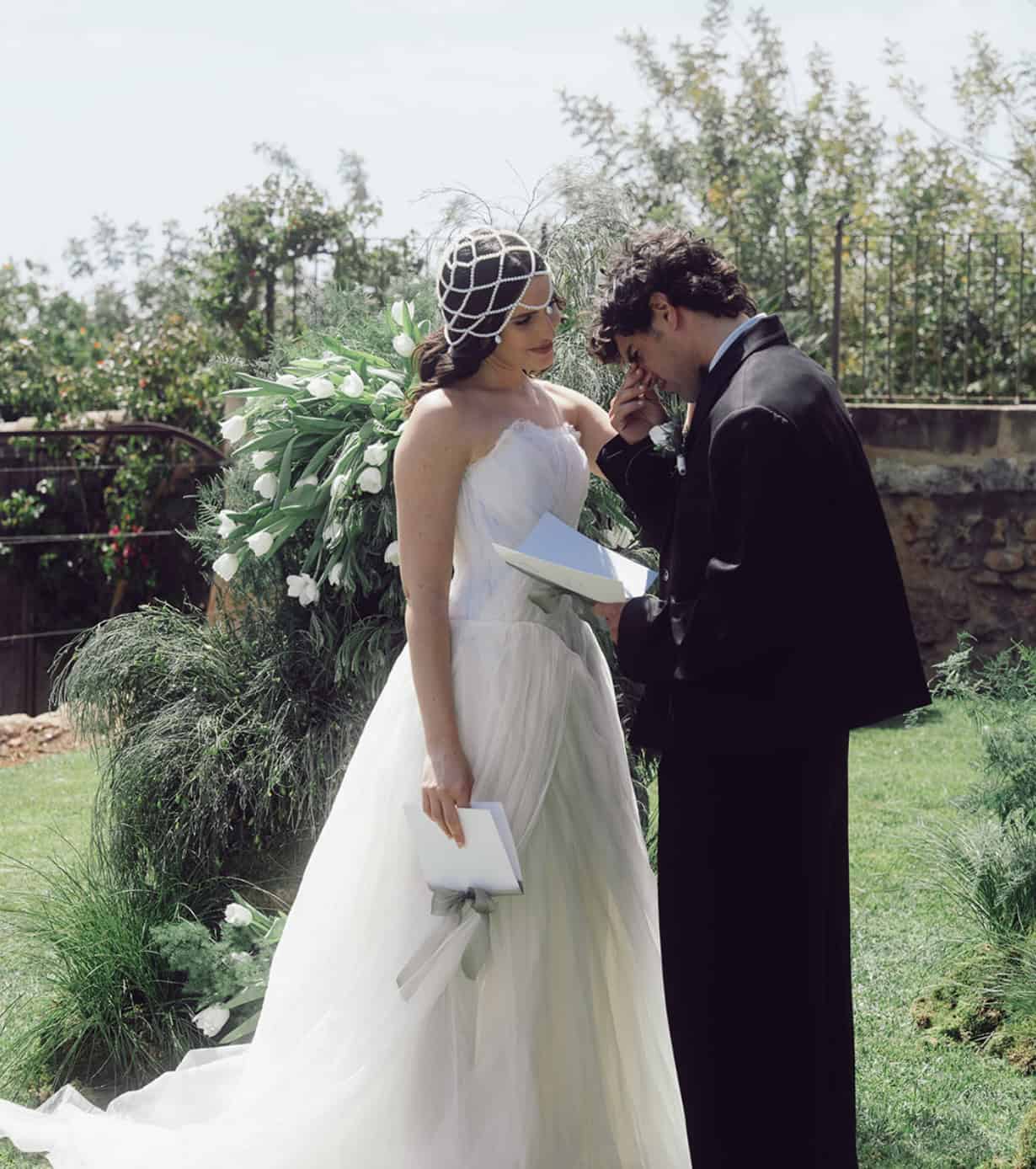 Bride and groom sharing an intimate moment during a destination wedding in Italy
