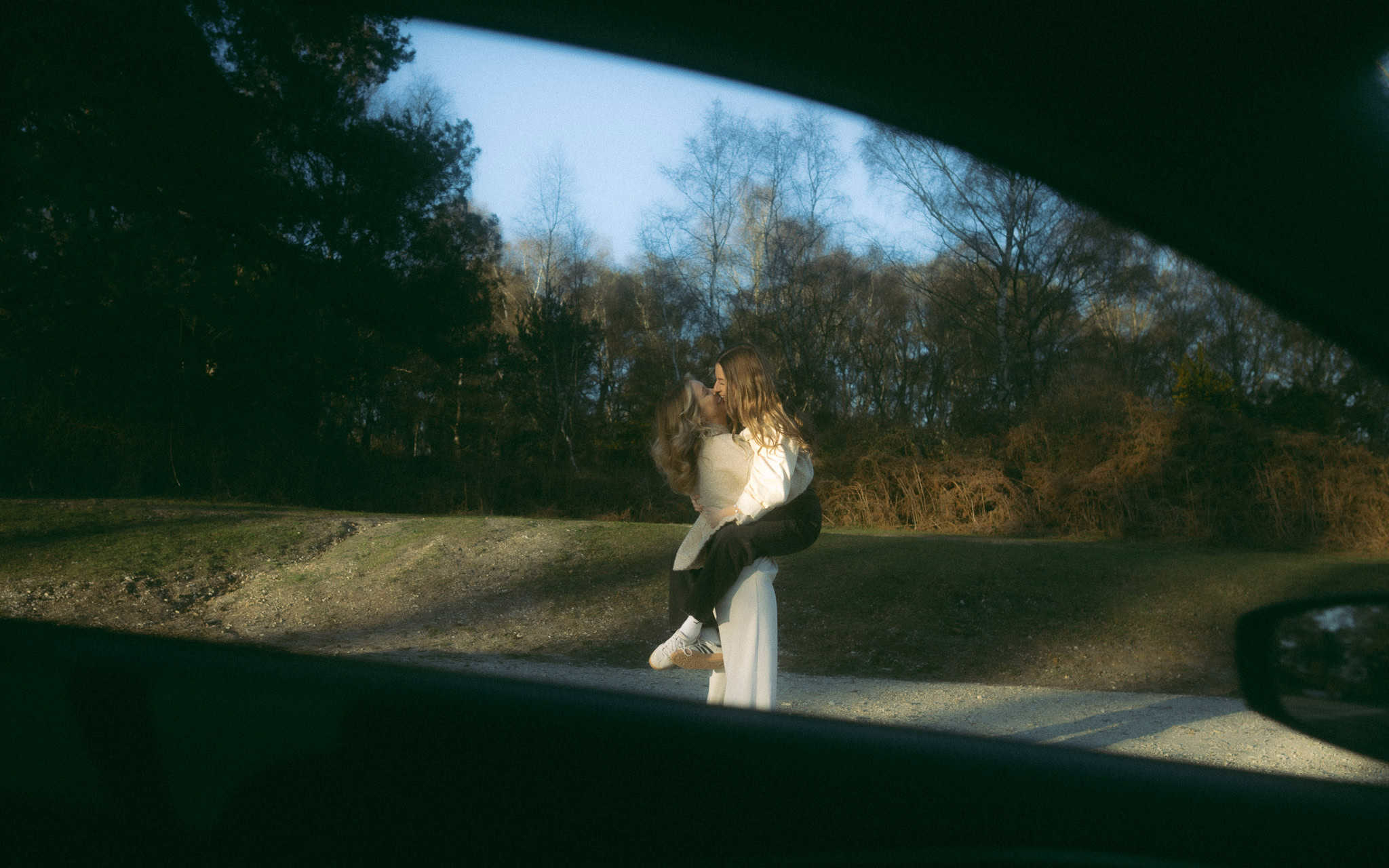 Cinematic sunset couple session in the Cotswolds captured on film by luxury wedding photographer UK