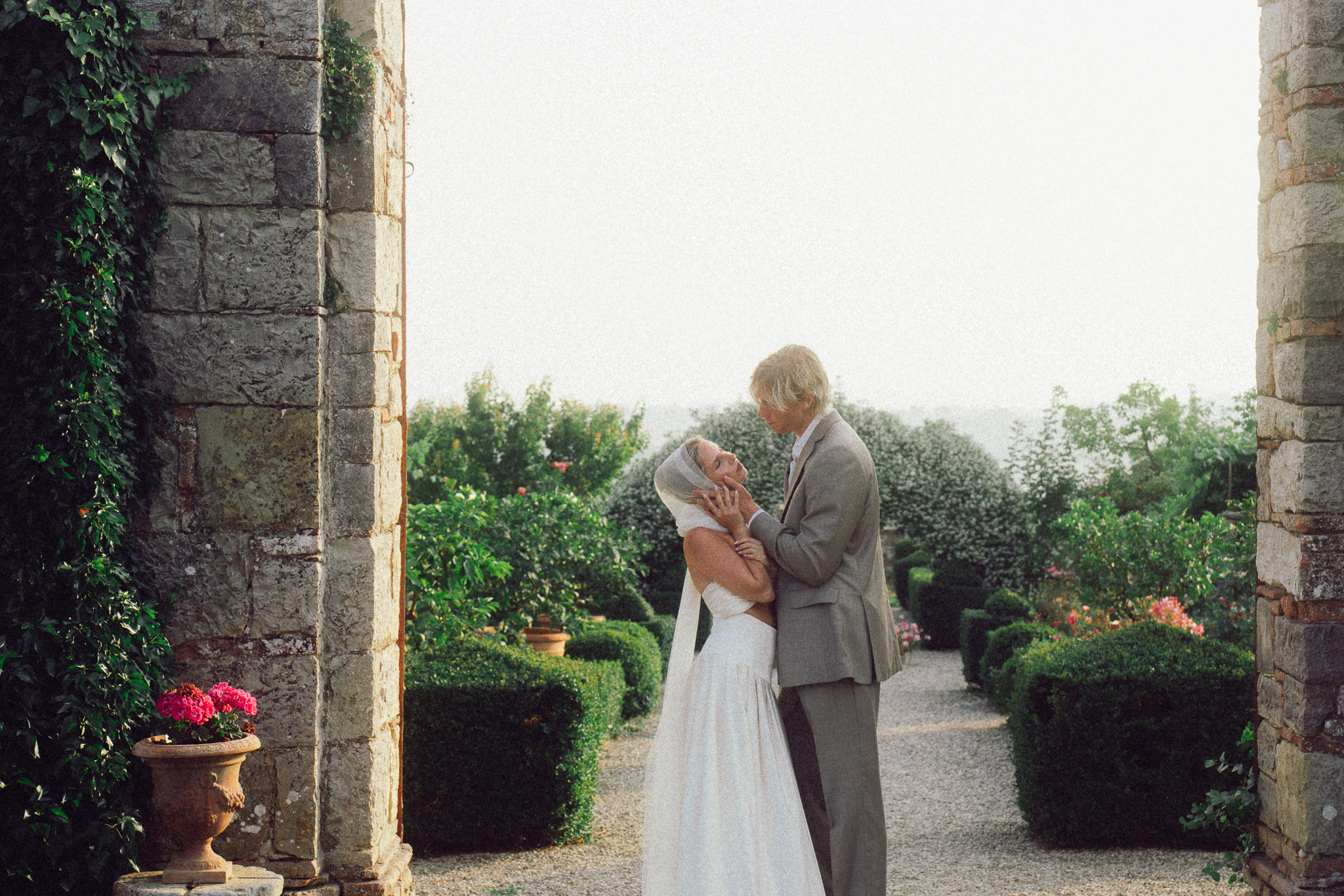 destination wedding in Tuscany at Villa di Geggiano with couple embracing