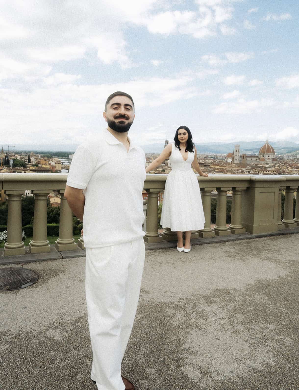 Couple overlooking Florence during an engagement session in Italy